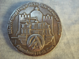 German plaque silver, Wettkampftage 1939 SA-Gruppe Hansa.Hamburg 14-18 juni.  NSFK- Gruppe Nordwest. Sieger in den Gruppenwettkämpfen 1939. 5cm.doorsnee.