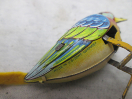 Tin toy bird, made in the US zone Germany, working. Blikken vogeltje werkend jaren 40-50.