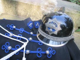 Dutch ceremonial uniform and helmet of the Rijkspolitie- ere-escorte. Uniform en helm van de Nederlandse Rijkspolitie Ere- Escorte.