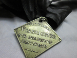Dutch indentification badge for the Amsterdam police in 1890-1920. indentificatie penning Buitengewoon Veldwachter der gemeente Amsterdam met nummer 596, zeldzaam stuk.
