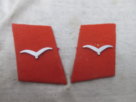 German FLAK artillery kannonier's collar tab. Duitse kraagspiegel van een FLAK artillerie eenheid.