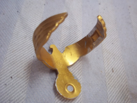 German breasteagle, goldfinish, Kriegsmarine or general,  used as napkin or badge for a walkingstick. Duitse borstadelaar aluminium goudkleurig Kriegsmarine omgebouwd tot servet ring of wandelstokplaatje. apart item.