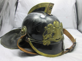 Leather fire department helmet of the City of Amsterdam. Leren Amsterdamse brandweerhelm. zeer nette staat, met brandweerstempel aan de binnenkant.
