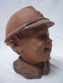 Moneybank made of terracotta Child with a French helmet nice item