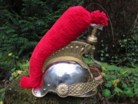 Ceremonial helmet of the Ivory Coast. Looks like the French Curasier helmet.  Republique de Cote  d'Ivoire. Parade helm prototype Ivoorkust, met i.p.v. Medusa hoofd een olifanten kop met slagtanden zeer bijzonder.
