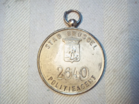 Belgium police indentification badge. Belgische politie penning 2 talig, van de stad Brussel, met nummer