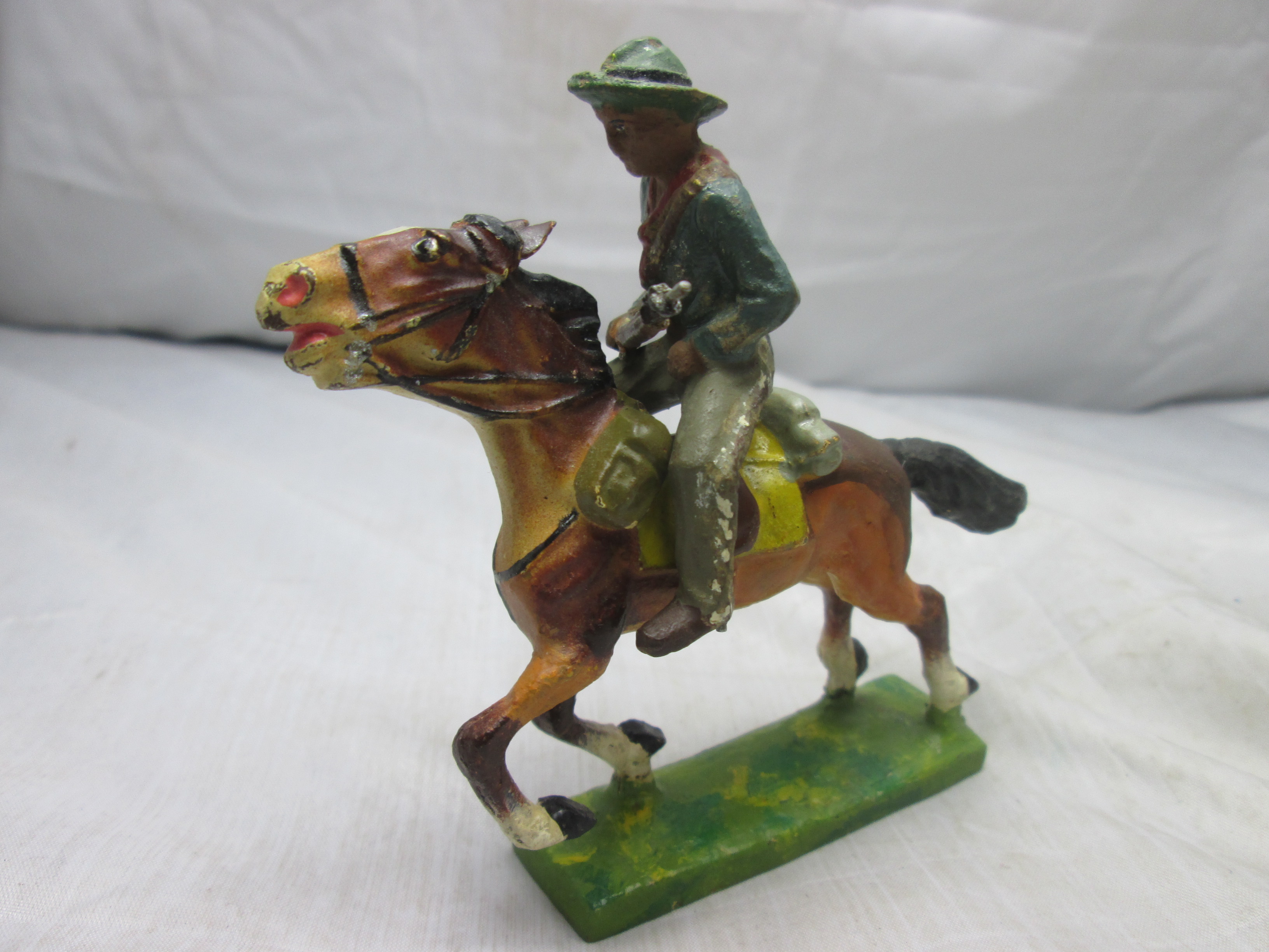 LINEOL cowboy on his horse. Cowboy op zijn paard