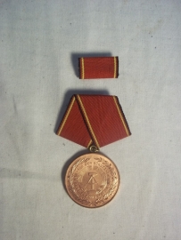 East- germany service medal. DDR- NVA rouwe Dienst medaille met baton