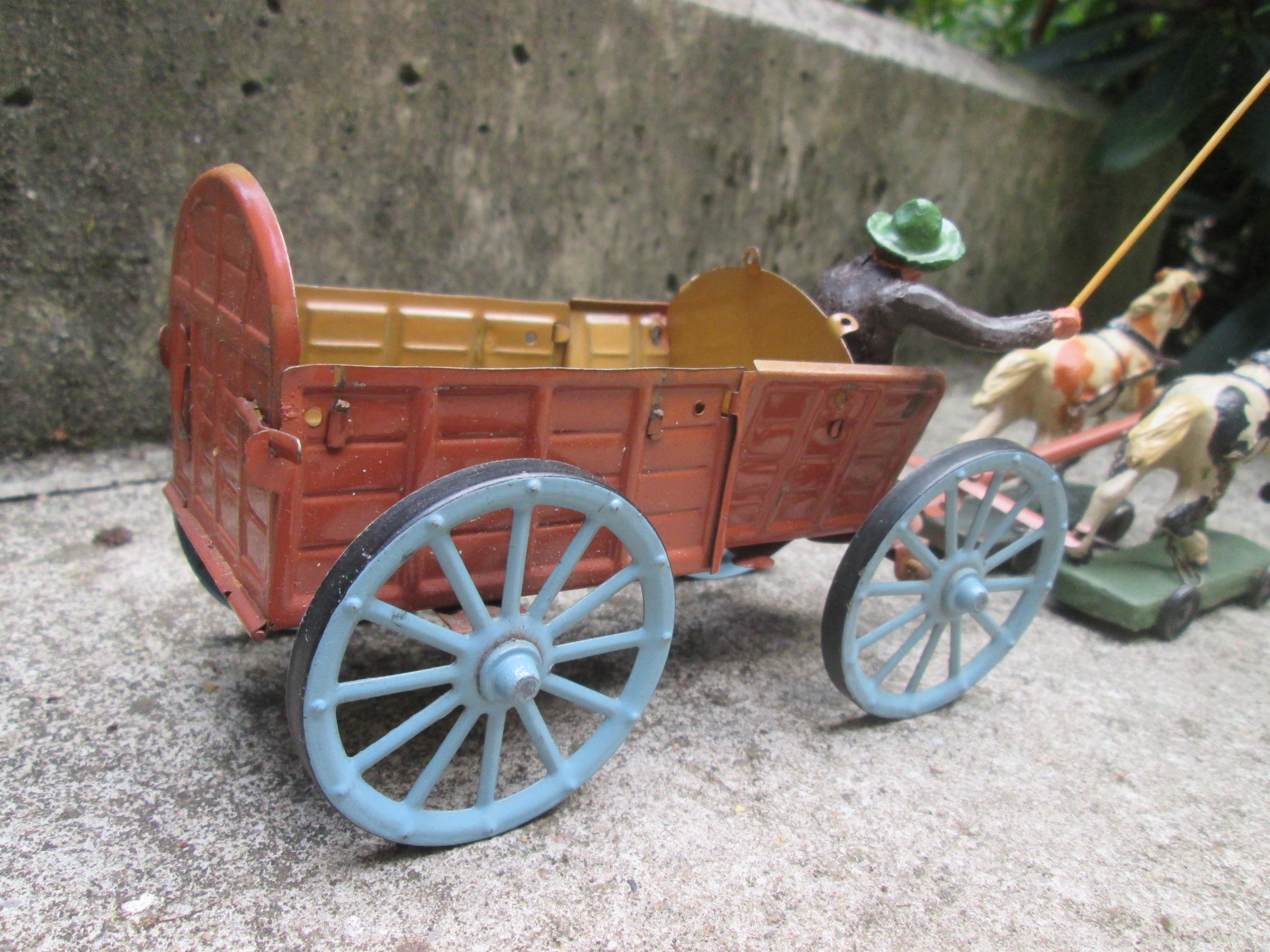 blikken speelgoed cowboy met kar getrokken door paarden leuke set.