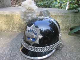 Dutch ceremonial uniform and helmet of the Rijkspolitie- ere-escorte. Uniform en helm van de Nederlandse Rijkspolitie Ere- Escorte.