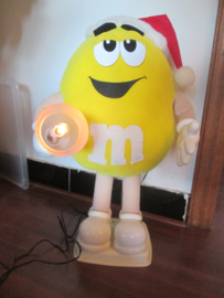 M&M  commercial shopping window figure in Christmas outfit with lamp. M&M etalage figuur in kerst sfeer met lamp.