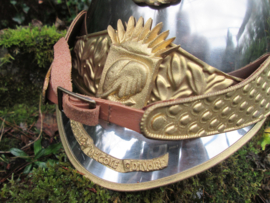 Ceremonial helmet of the Ivory Coast. Looks like the French Curasier helmet.  Republique de Cote  d'Ivoire. Parade helm prototype Ivoorkust, met i.p.v. Medusa hoofd een olifanten kop met slagtanden zeer bijzonder.