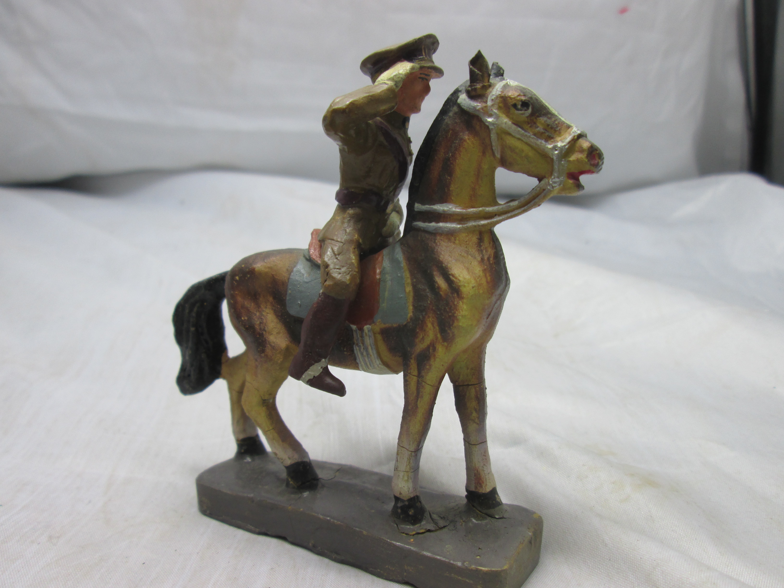 Fabrication Belge King of Belgium. FB speelgoed soldaat Belgische koning Albert te paard