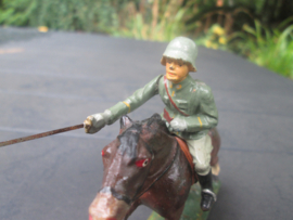 German officer on horse with sword. Duoitse wehrmacht officier op paard met sabel.