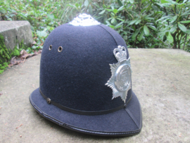British Bobbyhelmet Sussex Police. Engelse Bobbyhelm goede maat en conditie.