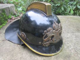 Dutch fire helmet city of Amsterdam 1960. Brandweerhelm Amsterdam met brons helm embleem apart stuk 1960.