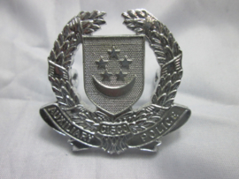 Singapore police cap badge auxilary Police. Petembleem politie Singapore.