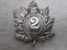 Britisch Canadian cap badge silver tone. WW2- Oueens own rifles of Canada.