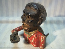 Spaarpotje gietijzer, jolly nigger. arm en ogen bewegen missiebusje, zeer decoratief jaren 30