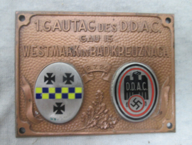 German plaque of the DDAC.  1. Gautag des D.D.A.C. Gau 15 Westmark in Bad Kreuznach 6.7.1934 nicely marked Adam Donner Elderfeld. Leuke aparte plakette met emaile emblemen.
