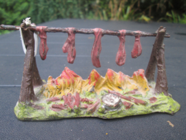 Elastolin open fire with meat.