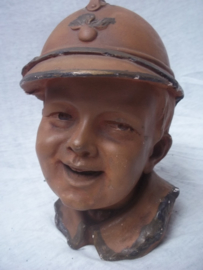 Moneybank made of terracotta Child with a French helmet nice item