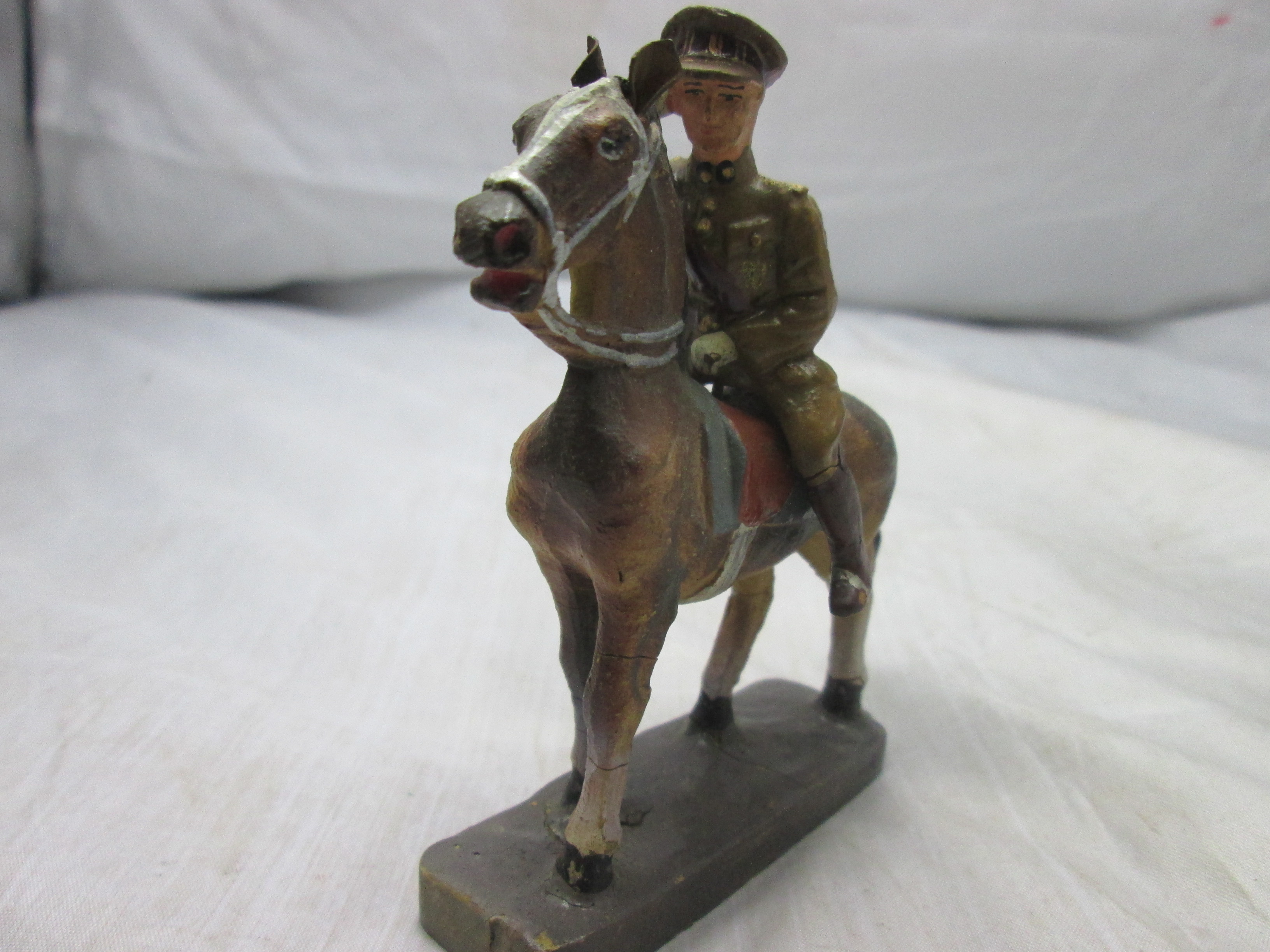 Fabrication Belge King of Belgium. FB speelgoed soldaat Belgische koning Albert te paard
