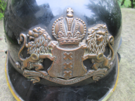 Dutch fire helmet city of Amsterdam 1960. Brandweerhelm Amsterdam met brons helm embleem apart stuk 1960.