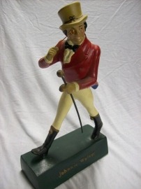Reclamebeeld  JOHNNIE WALKER WHISKY soort rubber, oud model met groene voet 37 cm. perfekte staat