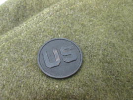 US overseas cap with badge. Amerikaanse wollige manschappen kwartiersmuts met US embleem.