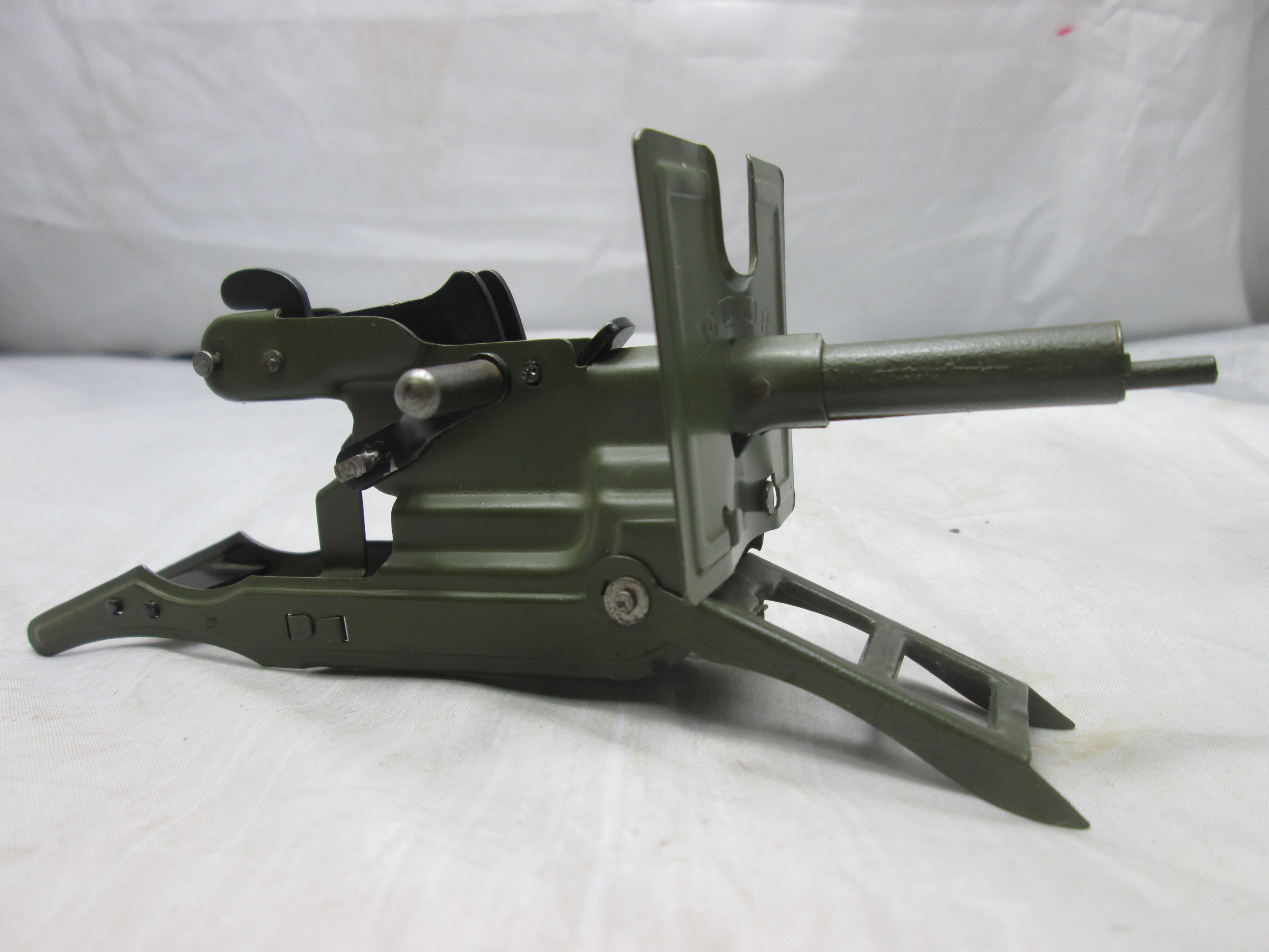 Toy machinegun in mintcondition. Blikken machinegeweer mint staat Made in Germany EDOR jaren 30/40 werkend met een klappertjes mechanisme