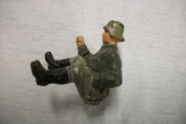 German toy soldier sitting, driver for a vehicle. Duits speelgoed soldaat chauffeur , koetsier