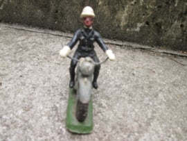 Belgium policeman on motor. Belgische politie agent op motor met witte helm