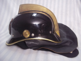 Dutch fire department helmet from the seventies. Nederlandse brandweerhelm uit de jaren  70, compleet met leren flap en brandwerende hoes, zeer goede staat.