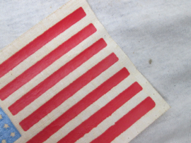 US sleeve badge first pattern printed on canvas worn by para units. Amerikaans mouwembleem de vlag gedrukt op zeildoek, canvas 1e model, uniform removed. zeldzaam stuk