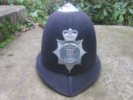 British Bobbyhelmet Sussex Police. Engelse Bobbyhelm goede maat en conditie.