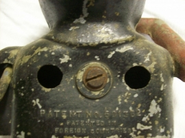 Money bank aluminium ,he is eating a coin. Jolly nigger bank a real old one