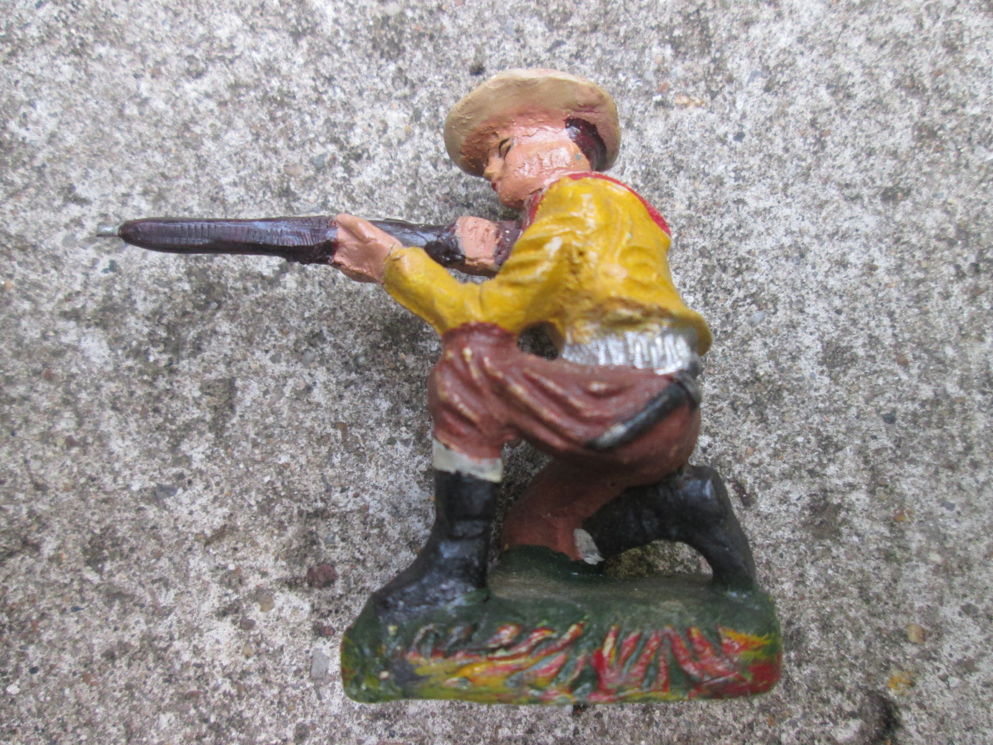 DURSO cowboy with rifle. Durso cowboy met geweer knielend
