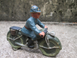Unmarked soldier on motor Soldaat op motor blauw uniform