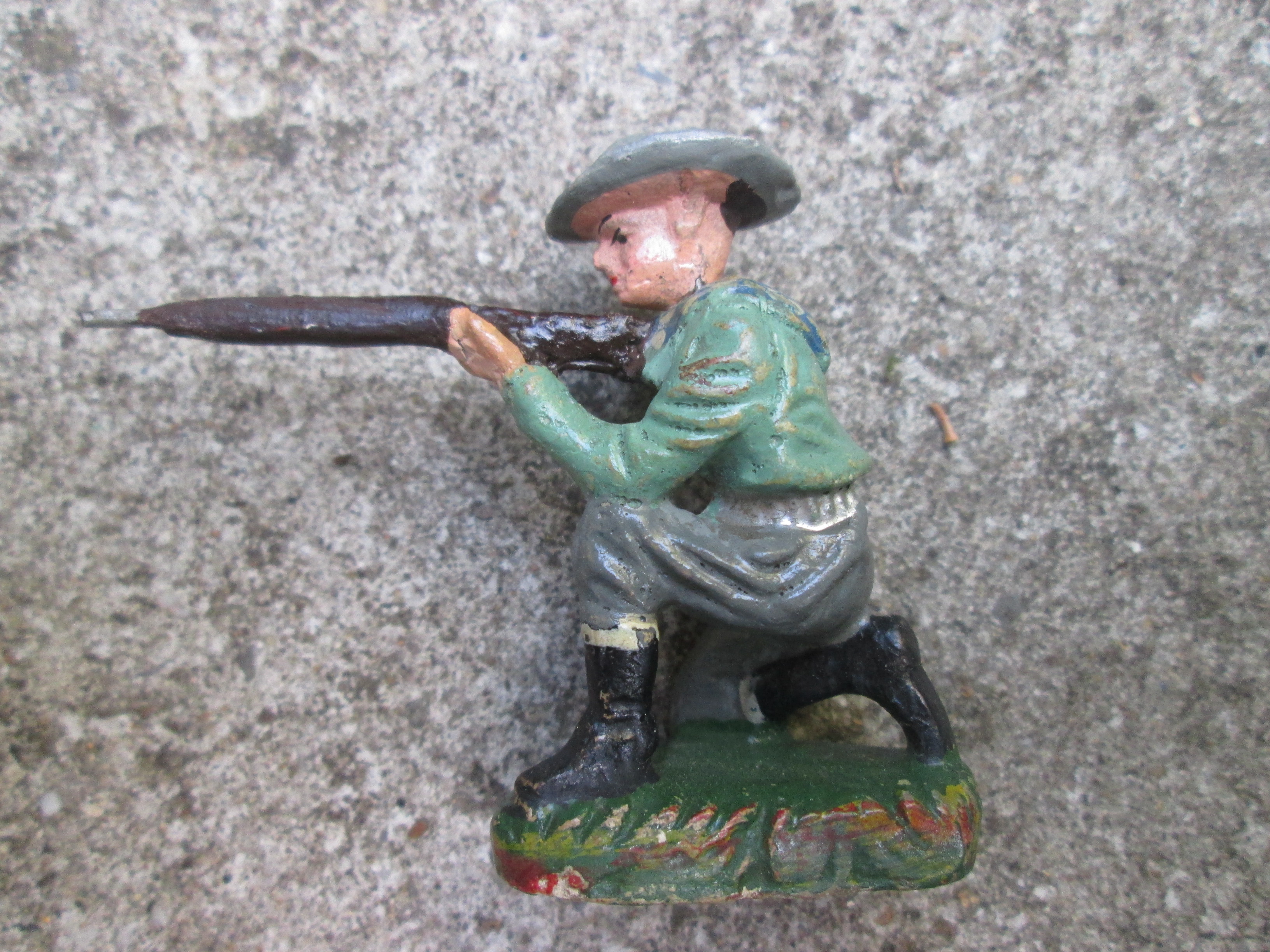 DURSO cowboy with rifle, knielende schutter met geweer