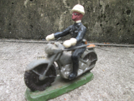 Belgium policeman on motor. Belgische politie agent op motor met witte helm