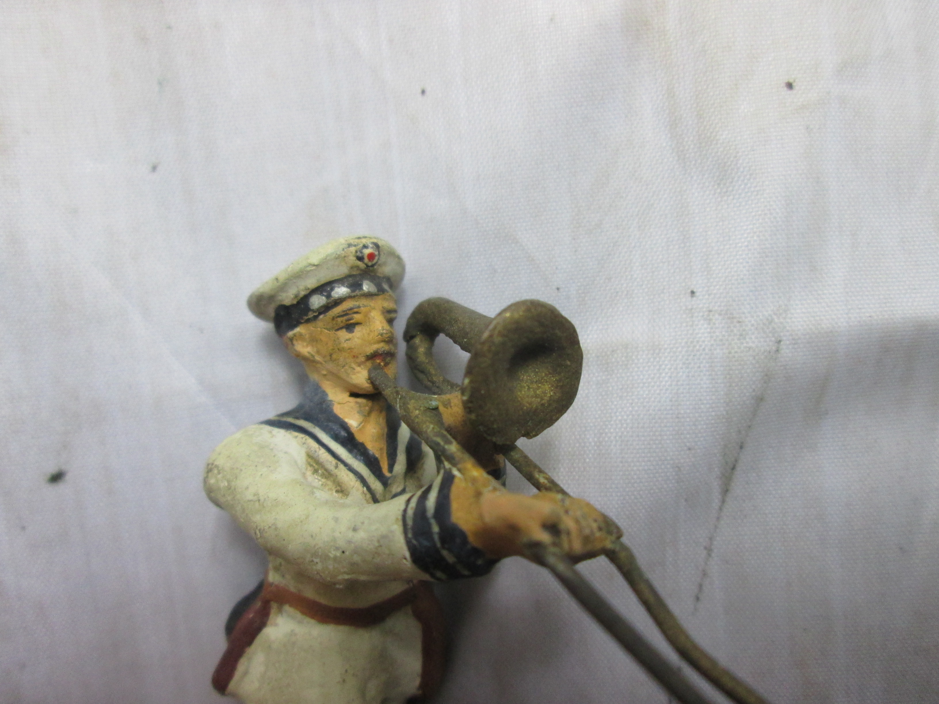 German Navy toy soldier. Duits speelgoed soldaatje Kriegsmarine drumband schuiftrombone.