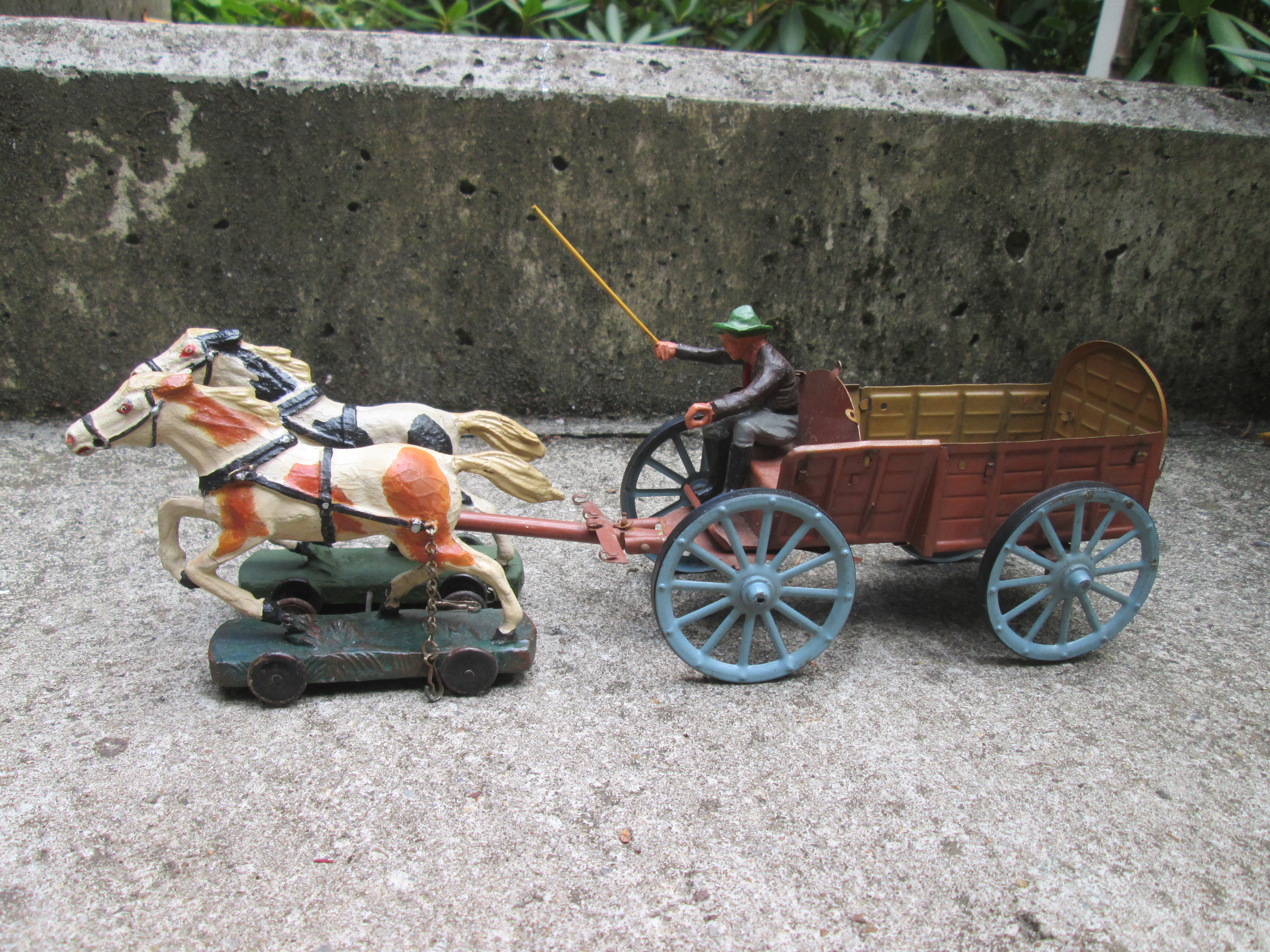 blikken speelgoed cowboy met kar getrokken door paarden leuke set.