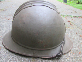 Belgium steelhelmet M 1915 also worn after 1918. Belgische helm M15 bruine kleur interbellum gedragen met origineel binnenwerk.