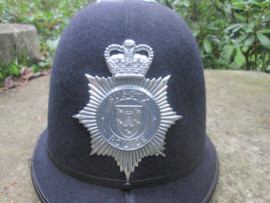 British Bobbyhelmet Sussex Police. Engelse Bobbyhelm goede maat en conditie.