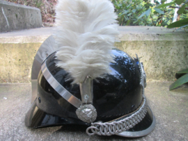 Dutch ceremonial uniform and helmet of the Rijkspolitie- ere-escorte. Uniform en helm van de Nederlandse Rijkspolitie Ere- Escorte.