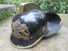 Dutch fire helmet city of Amsterdam 1960. Brandweerhelm Amsterdam met brons helm embleem apart stuk 1960.