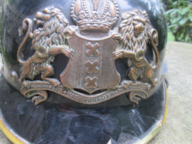 Dutch fire helmet city of Amsterdam 1960. Brandweerhelm Amsterdam met brons helm embleem apart stuk 1960.