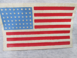 US sleeve badge first pattern printed on canvas worn by para units. Amerikaans mouwembleem de vlag gedrukt op zeildoek, canvas 1e model, uniform removed. zeldzaam stuk