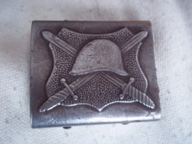 Rumanian army buckle with Dutch helmet.Roemeens koppelslot met Nederlandse helm, van het oude Roemeense leger.